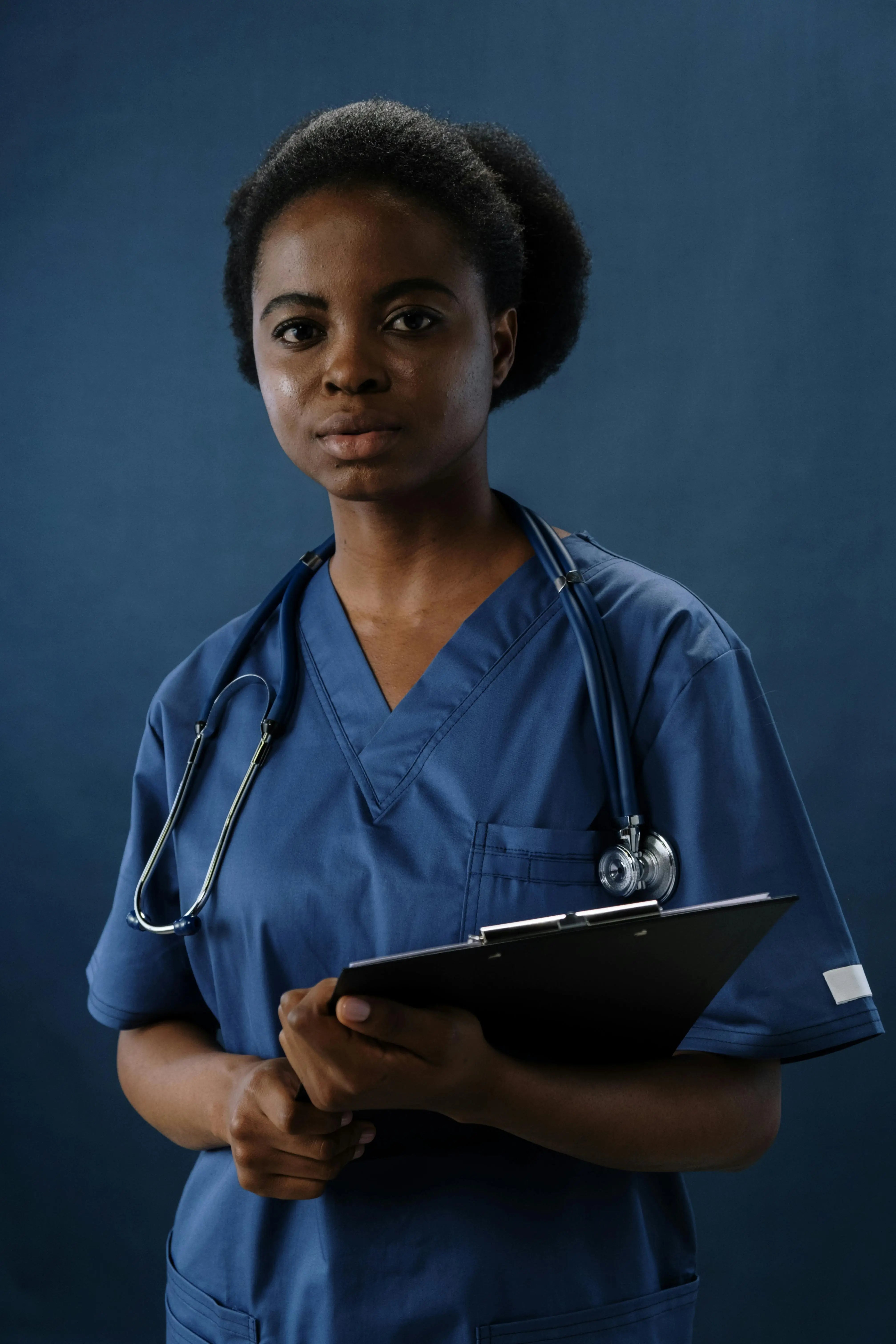 a caregiver holding notes for supplying seniors medical supply